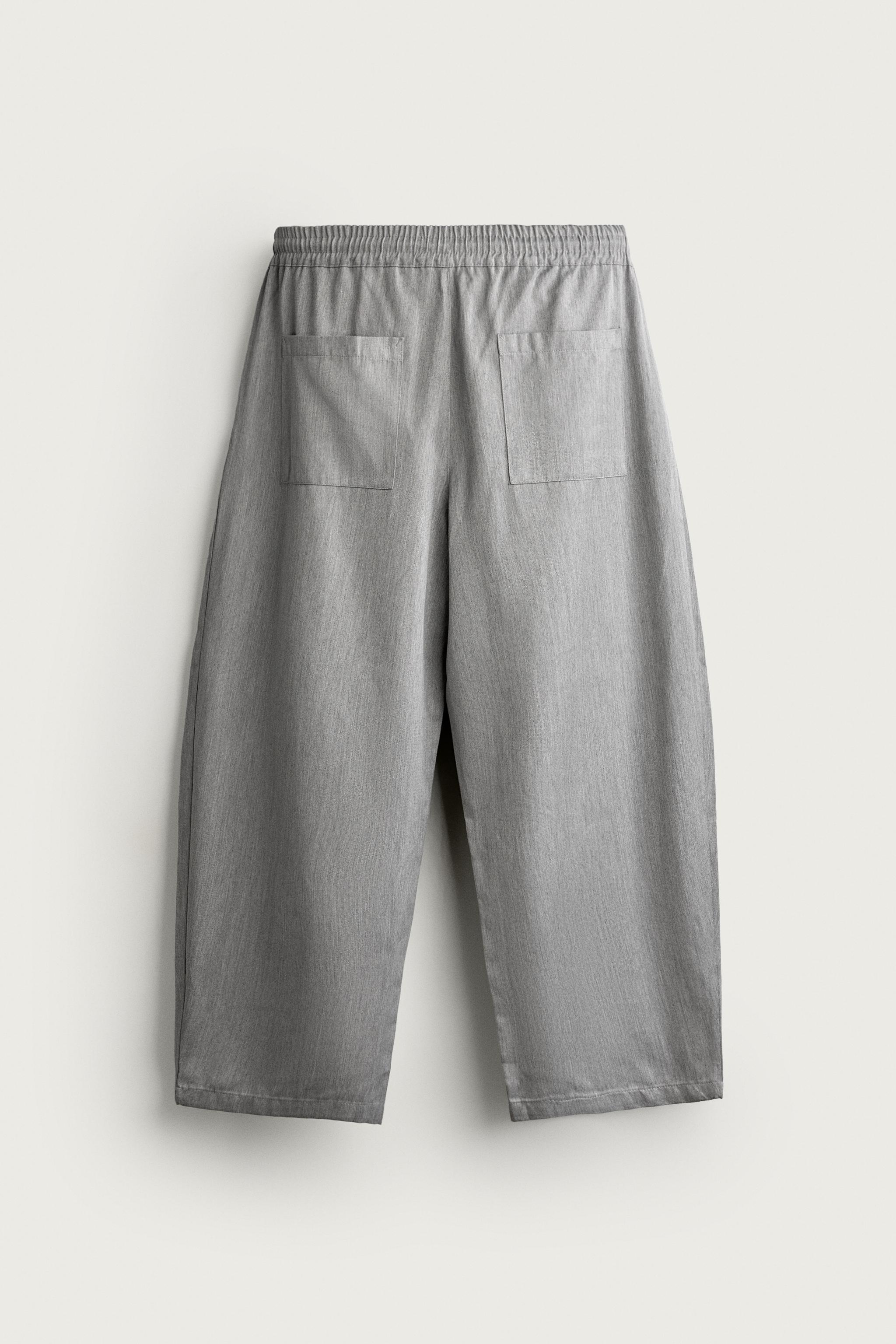 PANTALON BALLOON FIT À PLIS LATÉRAUX